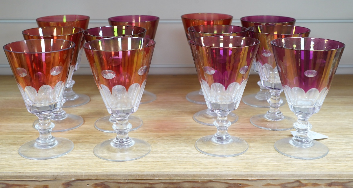 Twelve red lustre cut glass, stemmed wine glasses. 15cm high. Condition - fair to good